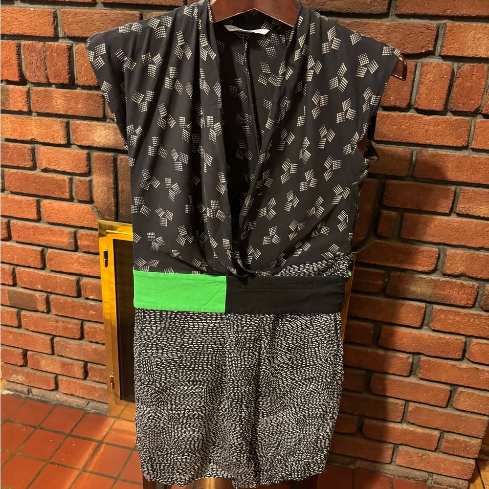 Diane Von Furstenberg 100% silk Black 
Wrap Dress with Neon Green Accent size S